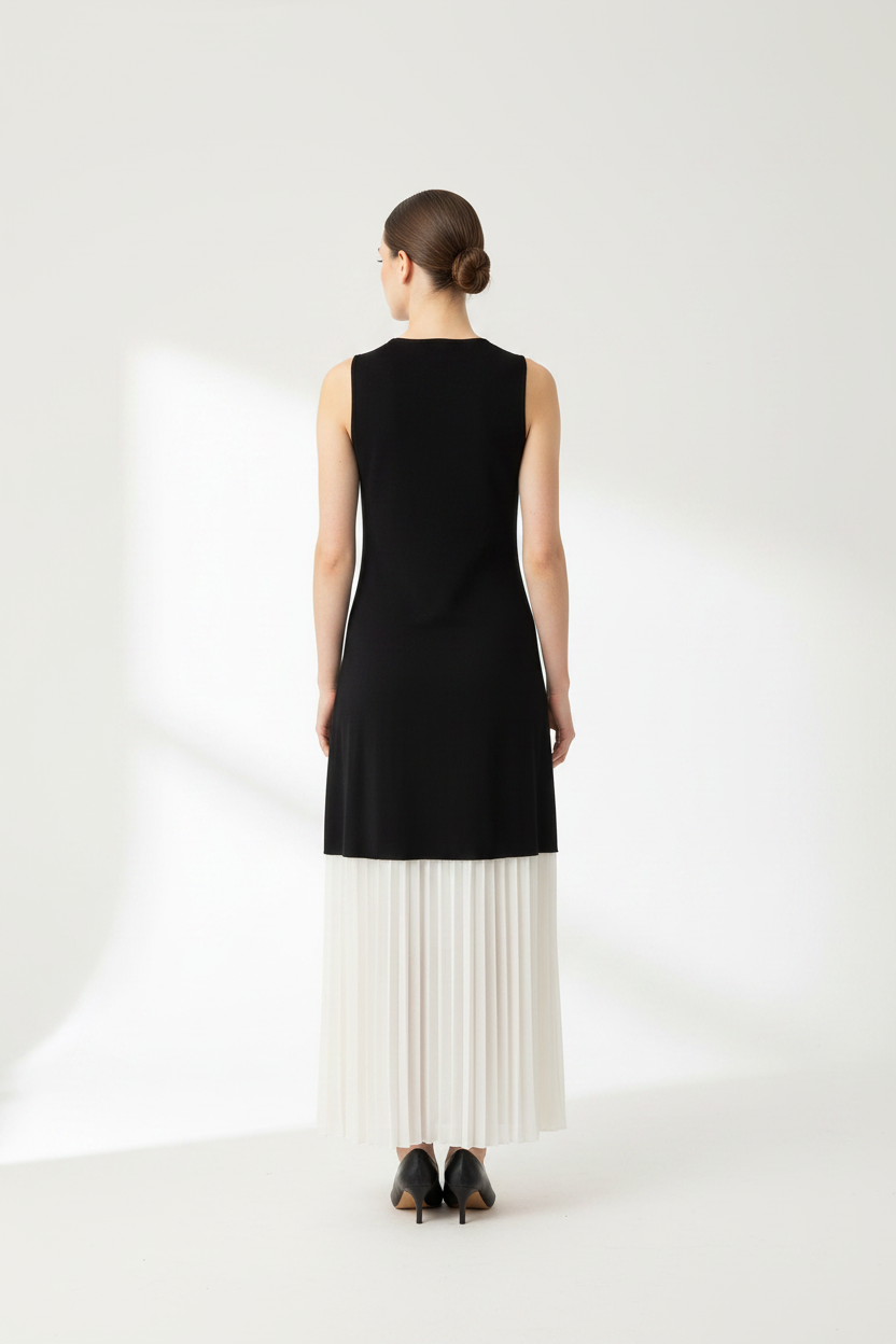 Back view — black knit & white pleated maxi dress