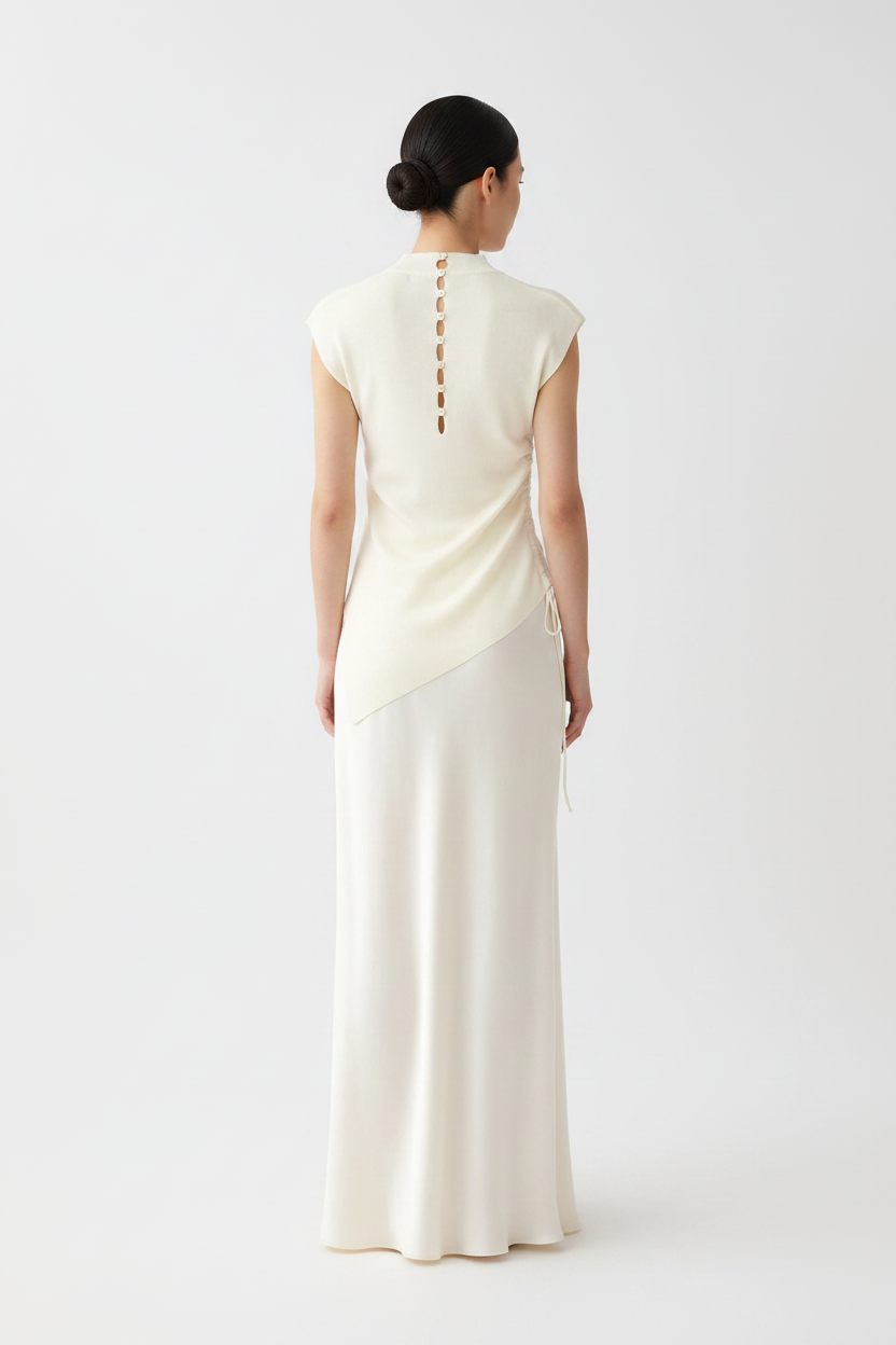 Back view – Cream Button-Back Knit Top with Satin Skirt