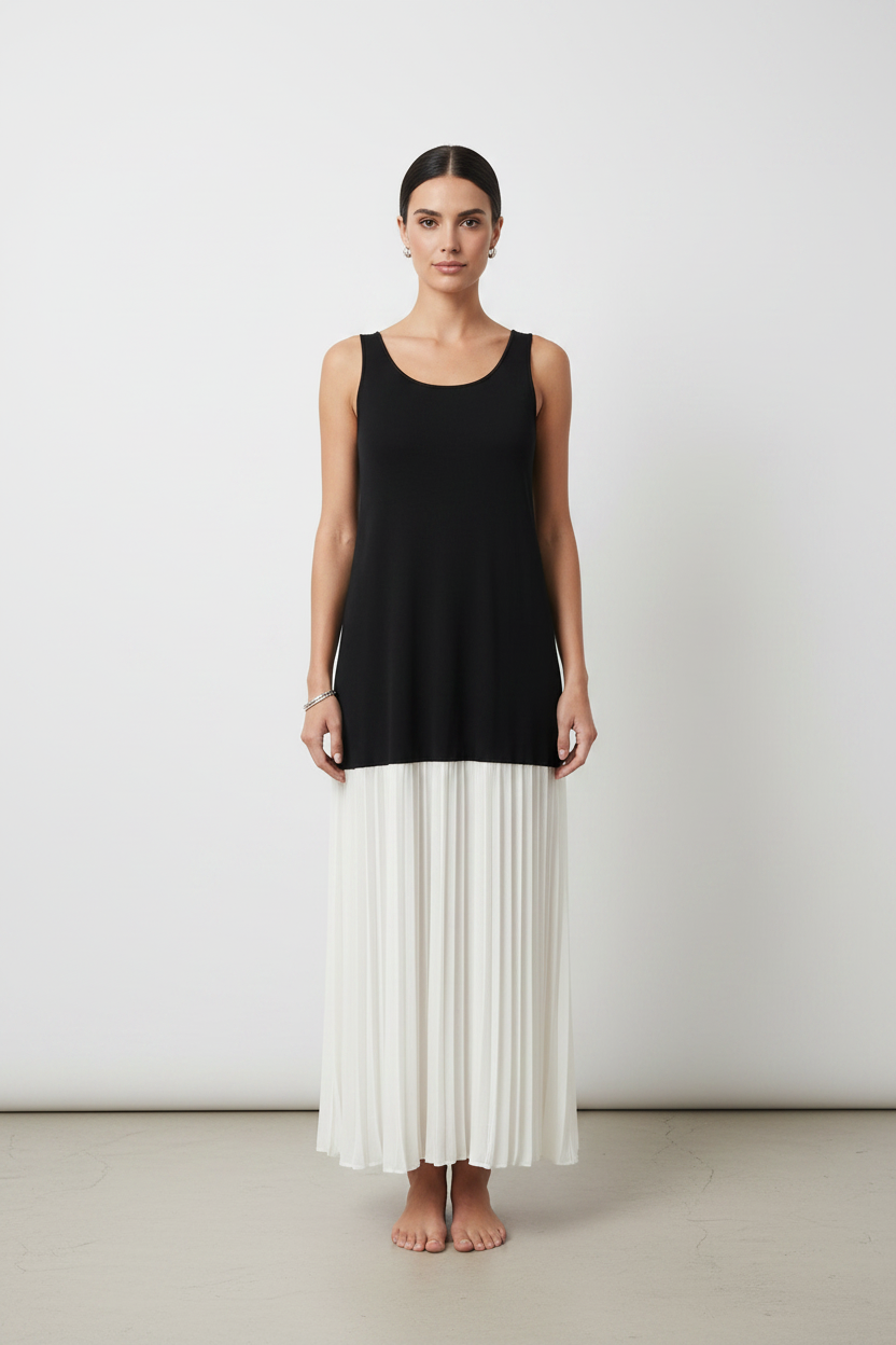 Front view — black knit & white pleated maxi dress