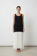 Front view — black knit & white pleated maxi dress