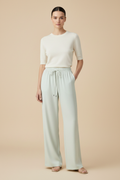 Front view – Pale Mint Almost White Wide Leg Trousers