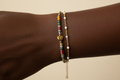 Model wearing Gold Heart Double-Layer Bracelet on wrist