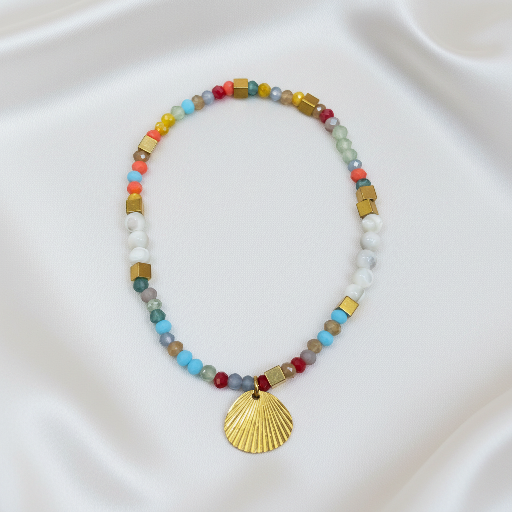 Rainbow Crystal Shell Charm Bracelet & Anklet flat lay on white satin