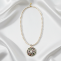 Pearl Necklace Flat Lay on White Satin