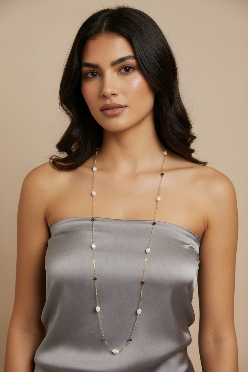 Real model with satin top and pearl necklace